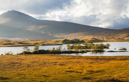 Wide view over Lochan Na H-Achlaise and Rannoch Moor in Glen Coe in the Scottish Highglandsの写真素材
