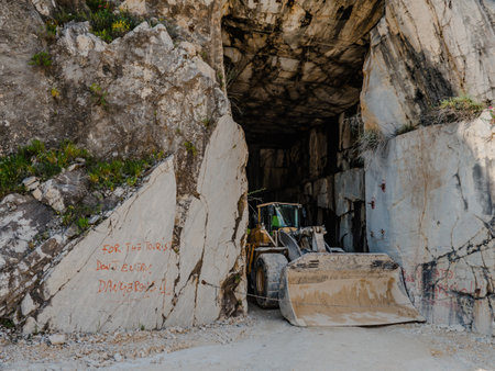 Shovel at the entrance of one of the quarries near Carrara, Italyのeditorial素材