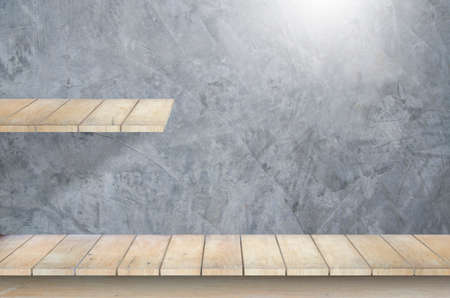 Two layers wooden table top on loft concrete wall background and white light.For montage product display or design key visual layout.kitchen or interior concept.view of copy space.の写真素材