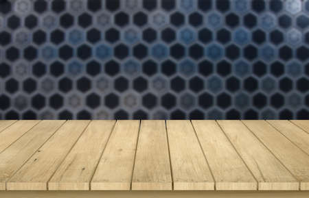 Wooden table top on blur honeycomb panel background.Place cosmetic,food,drink or other object.For...