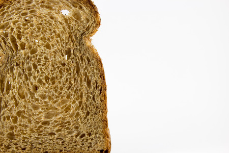 Brown bread slice isolated on white background