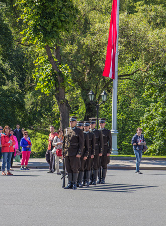 RIGA, LATVIA-JUNE 26, 2014: Honorary guard at Freedom Monument. Located in the centre of Riga, Latvia on Juner 26, 2014. Riga is European Capital of Culture.のeditorial素材