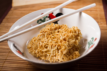 Instant noodles are not cooked.の写真素材