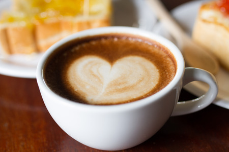 Hard Working with Mocca coffee in cafe Shopの写真素材