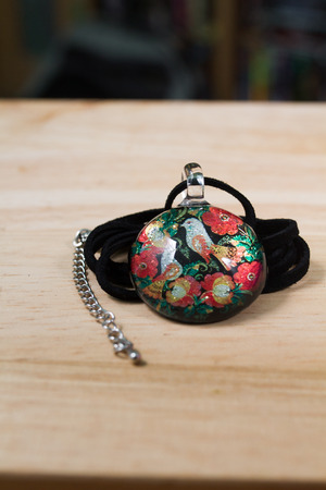 Birds in a Ceramic Black Necklaceの写真素材