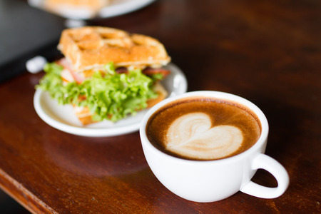 Coffee and bread with jamの写真素材