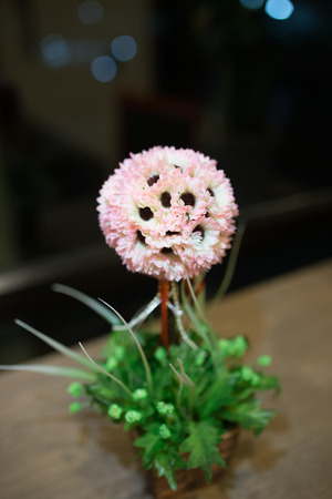 plastic flowers on the table in coffee shop.の写真素材