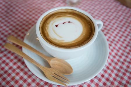 Cappuccino, latte blended with honey supply in coffee shop.の写真素材