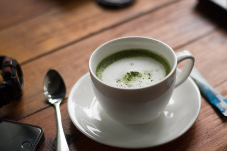 Green tea, milk, hot afternoon.
