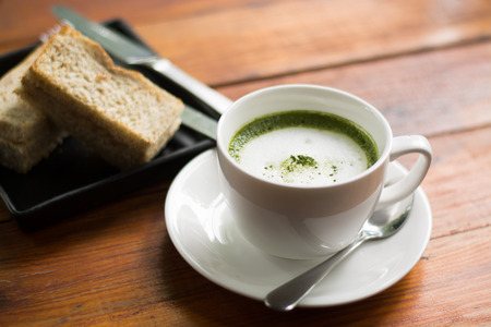 Green tea, milk, hot afternoon.の写真素材