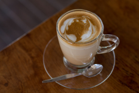 The hot Coffee capucino  in coffee shop.の写真素材