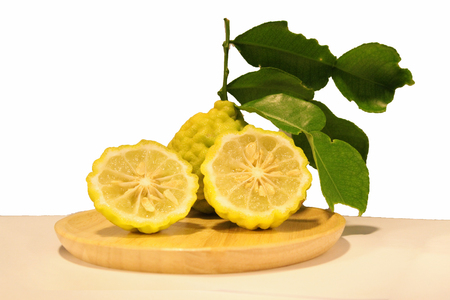Thai Bergamot is vegetable used for cooking To have a delicious taste And there are many useful herbs Such as used in the care of the hair and scalp, with white backgroundの写真素材