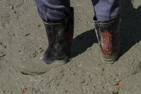 Pouring cement in the alley made by thai lebor.の写真素材
