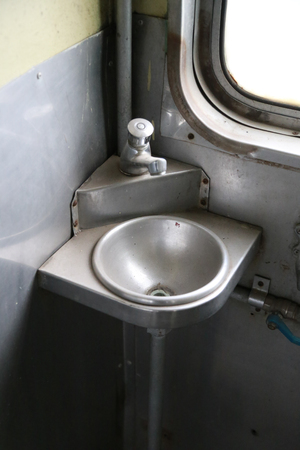 The toilet is on the thai abandoned train.の写真素材