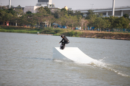 man Surfing at the water sports arena.の写真素材