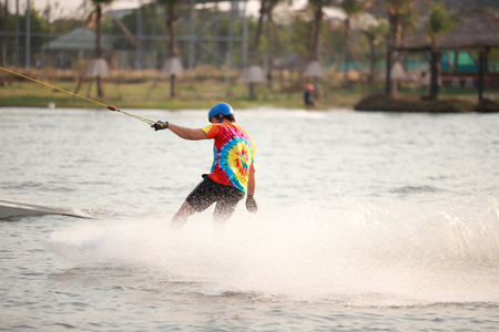 man Surfing at the water sports arena.の写真素材