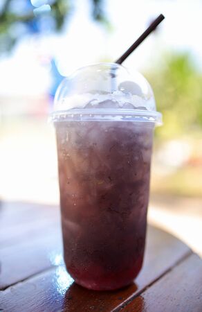 grape water and soda on table