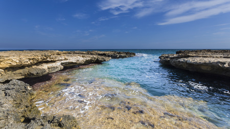 image of the coast of Alicante in Spain with rocks and the Mediterranean Seaの写真素材