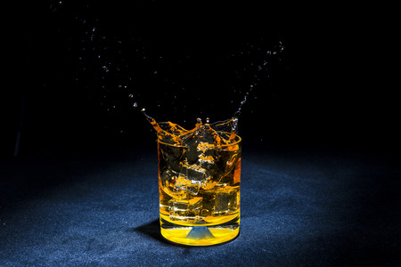 ice with liquid splashingの写真素材