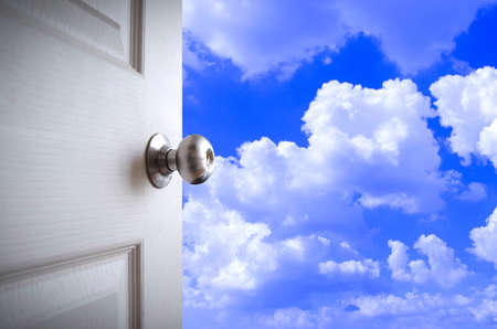 open door to the skyの写真素材