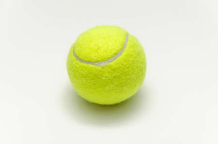 tennis ball isolated on white backgroundの写真素材