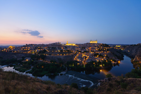 Night view of the historic city of Toledo in Spainの写真素材