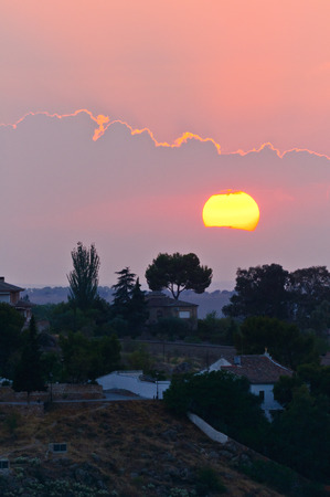 Sunset of the historic city of Toledo at dusk in Spainの写真素材