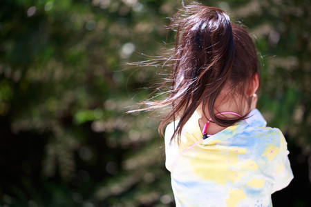 The girl from behindの写真素材