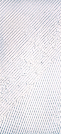 White Groomed Snow Texture on Ski Slope (Corduroy Pattern Background)
