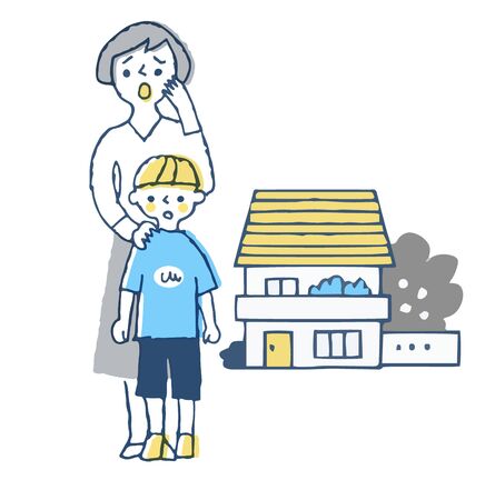 Mother and child with an uneasy expression in fronの写真素材