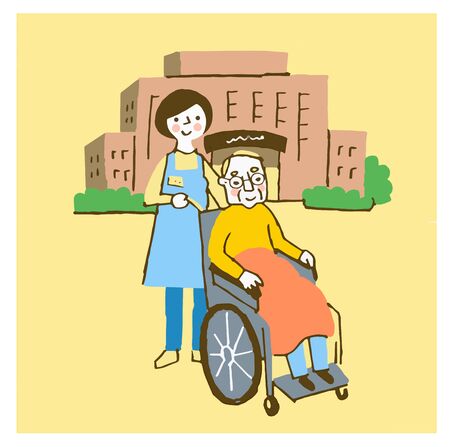 A wheelchair grandfather and a caregiverの写真素材