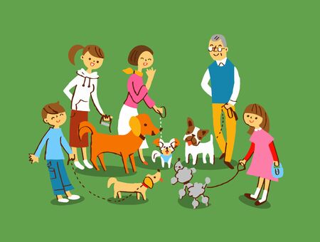 Multiple dogs and ownersの写真素材