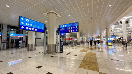 DUBAI, UNITED ARAB EMIRATES. 15 SEPTEMBER 2023. A symphony of movement as people navigate the lively environment of Dubai Airportのeditorial素材