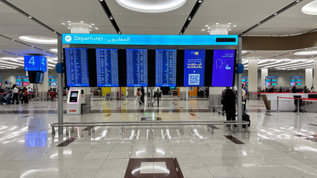 DUBAI, UAE. 16 SEPTEMBER 2023. Dubai Airport's departure board, the nerve center guiding worldwide journeysのeditorial素材