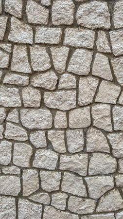 Detail of a stone wall showing natural colors and texturesの写真素材