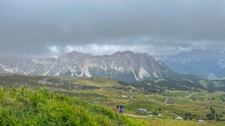 Sassolungo's majesty unfolds from Seceda, a panoramic masterpiece in the Dolomites, capturing the essence of South Tyrol's awe-inspiring mountain allure.のeditorial素材