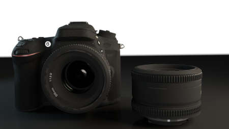 Camera with lens isolated in dark areaの写真素材