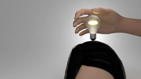 stealing an idea by grabbing the bulbの写真素材