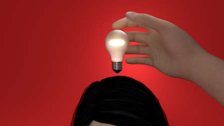stealing an idea by grabbing the bulbの写真素材