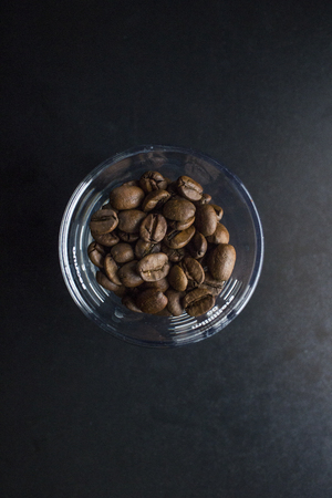 Grains of coffee in barista shotの写真素材