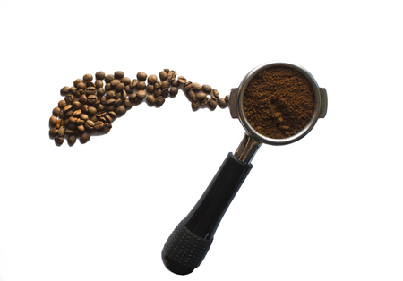 portafilter with ground coffee, and coffee bean, isolatedの写真素材