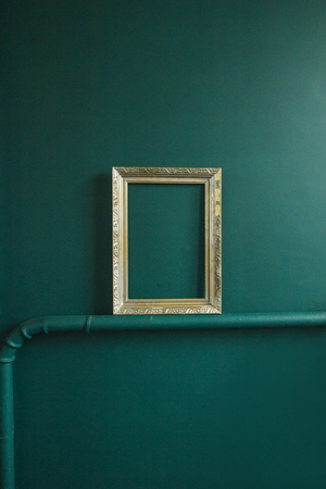 Frame in the room with blue wall.の写真素材