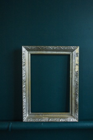Frame in the room with blue wall.の写真素材