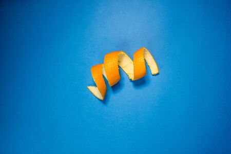 orange peel on a blue backgroundの写真素材