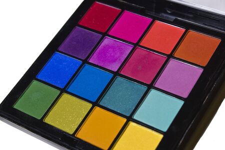Palette of colored eyeshadows, close-up on white backgroundの写真素材