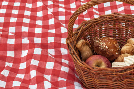 Picnic on the nature while on vacation. Dinner time. Different food products. Delicious appetizing food.の写真素材