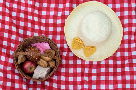 Picnic on the nature while on vacation. Dinner time. Different food products. Delicious appetizing food.の写真素材