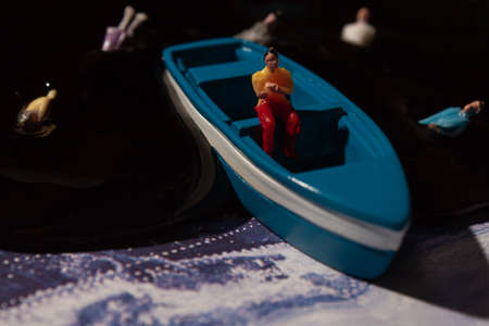 ecology theme, water pollution, a man in a boatの写真素材