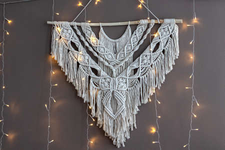 Beautiful boho macrame wall panel will add a cozy atmosphereの写真素材