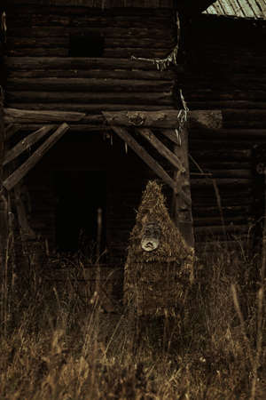 scary abandoned village house with a monster. Halloween themed photoの写真素材